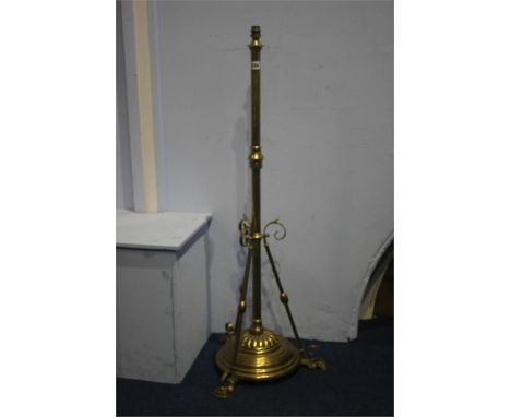 A brass Art Nouveau style standard lamp.