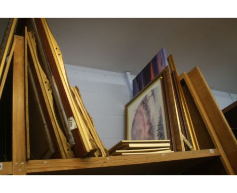 Shelf of pictures.