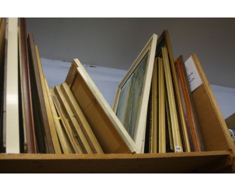 Shelf of pictures.