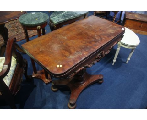 A Victorian mahogany fold over card table.