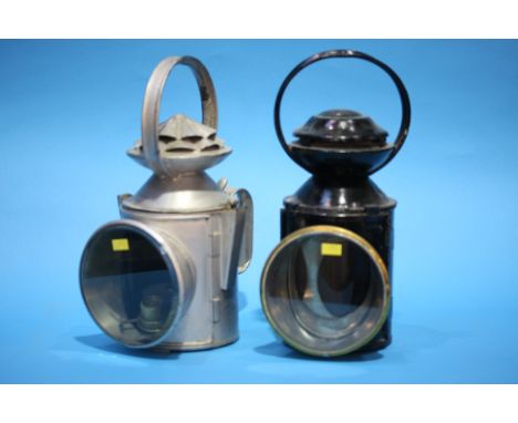 An L.N.E.R. railway lamp, 'Lower Batley 3' and a BR (E) lamp. (2)
