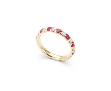 A ruby and diamond eternity ring set with twelve circular-cut rubies and twelve round brilliant-cut diamonds, modelled in 18c