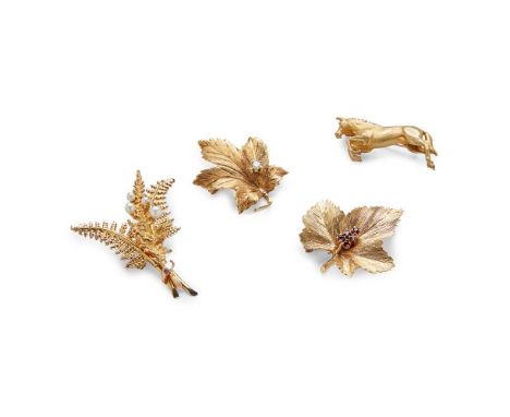 Mappin &amp; Webb: A maple leaf brooch naturalistically modelled, claw-set with a small round brilliant-cut diamond, modelled