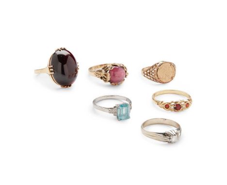 A collection of gem-set rings including a blue topaz and diamond ring, stamped 18ct; a single-stone diamond ring, unmarked; a