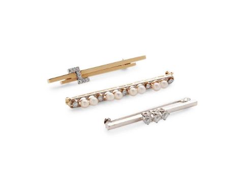 A collection of diamond and pearl brooches including a three-stone diamond bar brooch, modelled in 18ct gold; a bar brooch wi