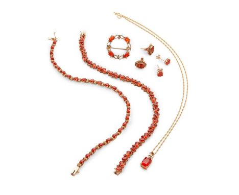 A collection of fire opal jewellery including a 9ct gold round and oval-cut fire opal bracelet; a 9ct gold pear-shaped fire o