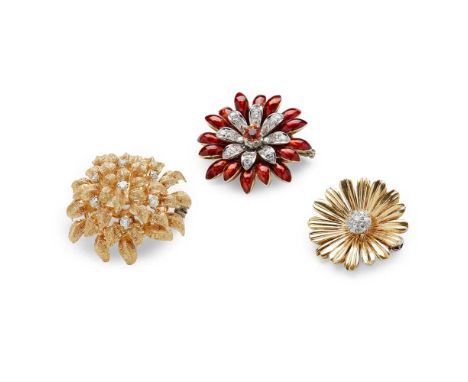 A collection of floral brooches the first modelled as a chrysanthemum with pavé-set diamond detail, stamped 750; another mode