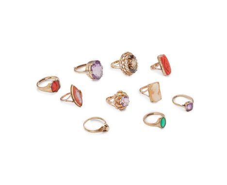 A collection of gem-set rings including a 9ct gold smokey quartz cocktail ring, a 9ct gold agate signet ring; an amethyst coc