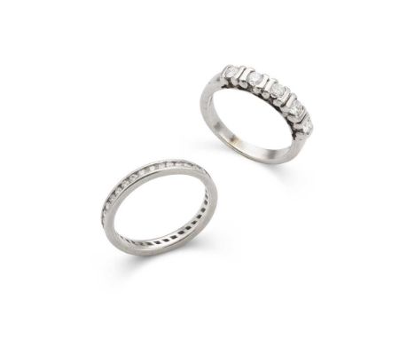 Two diamond rings the first bar-set with five round brilliant-cut diamonds, stamped 18kt 750; and a channel-set round brillia