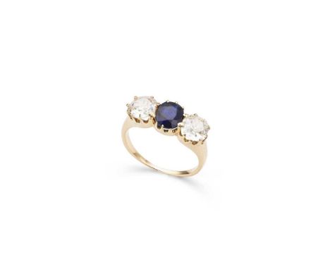 A late 19th-century sapphire and diamond three-stone ring claw-set with an oval-cut sapphire and two old round-cut diamonds, 