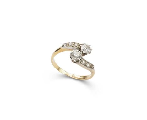 A diamond two-stone ring claw-set with two old round-cut diamonds, each shoulder set with three old round and eight-cut diamo