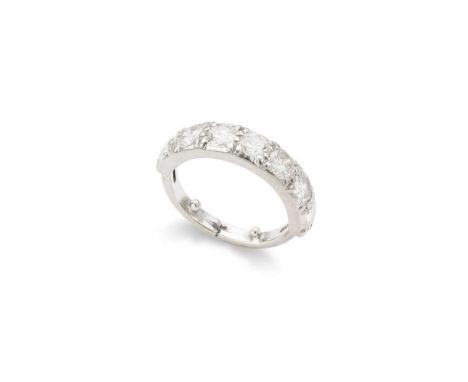 A diamond half-eternity ring set with seven round brilliant-cut diamonds, to an expandable band, unmarkedDimensions:Ring size