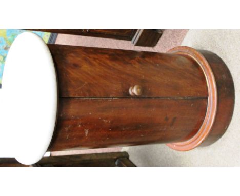 VICTORIAN MAHOGANY WASHSTAND
body formed of two pieces of mahogany, with white marble top over a single door opening to revea