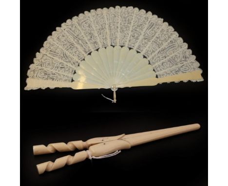 A Late 19th Century Ivory Fan, the monture and loop slightly shaped but otherwise plain, the leaf a cream silk tape lace most