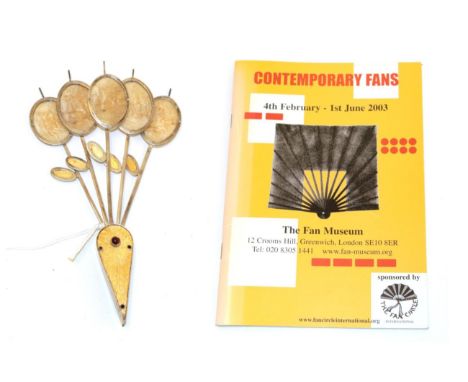 Honesty: A Fan Shape with 23 carat gold leaf panel and an amber bead rivet, the tops of the “sticks” are made from real “hone