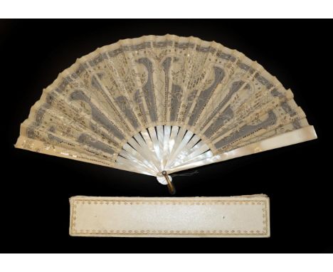 An Elegant Circa 1900 Sequin Fan, the monture of white Mother of Pearl, with bone ribs. The cream net leaf is overlaid with c