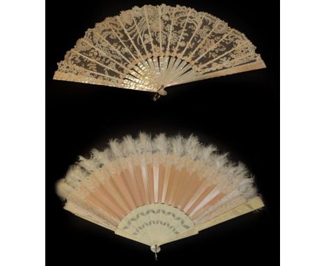 A Late 19th Century Pink Mother-of-Pearl Fan, mounted with a lace leaf of Brussels Bobbin Appliqué, featuring many different 