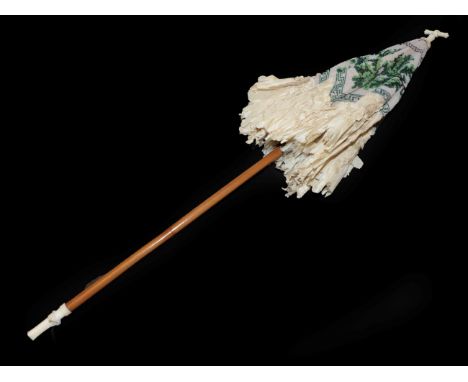 A Rare Parasol with Beaded Cover, circa 1850's, the shaft of tan wood, the ribs of metal, the finial and cap ivory. Lined and