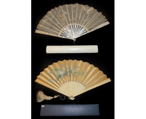 A White Mother-of-Pearl Fan, circa 1900, mounted with cream gauze, cream silk being applied and secured with tiny silver sequ