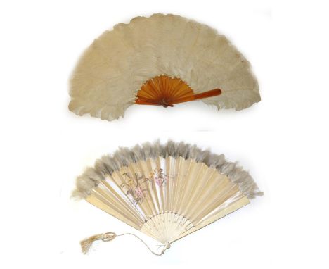 A Cream Ostrich Feather Fan, circa 1900, medium to large size, the feathers mounted on resin sticks. Overall height 17 inches