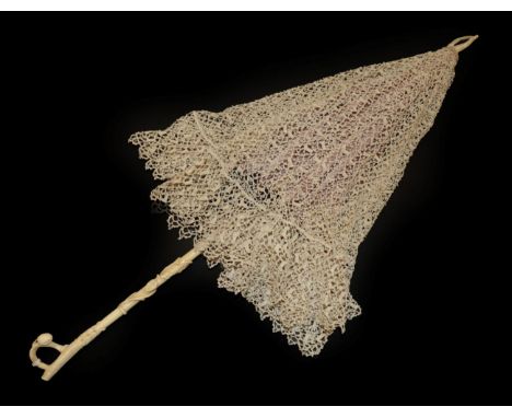 An Attractive Irish Crochet Lace Folding Parasol, post 1860, the carved lower shaft slightly grainy, most likely bone, the fi