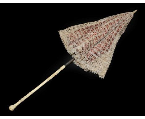 A 19th Century Folding Parasol, the cover made of extremely fine Bedford Maltese lace, insertion panels with raised wheatears