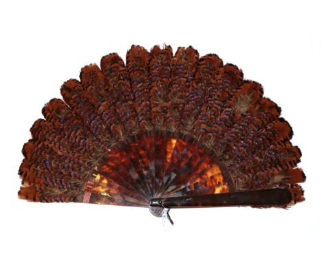 A Good Pheasant Feather Fan, circa 1880's, the monture a large brisé fan in tortoiseshell, with attractively mottled gorge. T