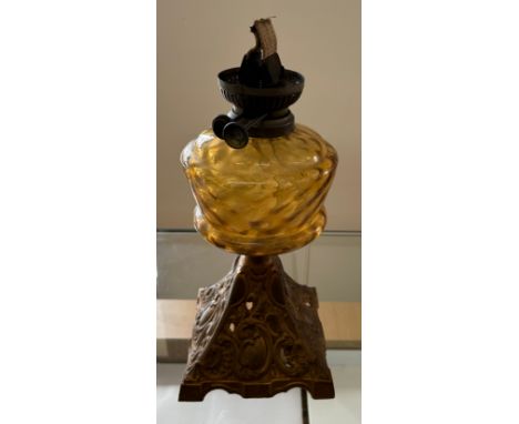 Victorian oil lamp on a cast base- no shade or funnel. Measures approx 13 inches tall