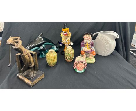 Selection of assorted pottery includes Poole dolphin, Murano glass clown etc 