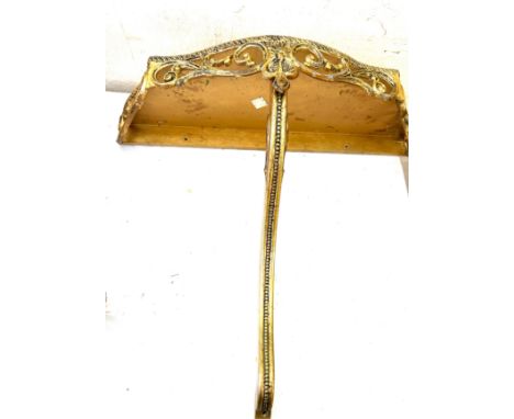 Gilt ornate wall shelf, approximate measurements: 24 by 9.5 inches