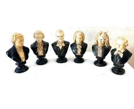 Selection of assorted busk figures includes book ends etc largest measures 9 inches tall