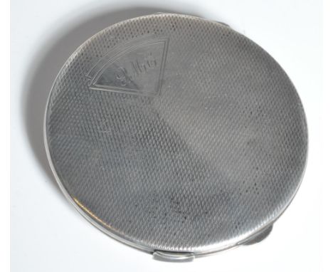 A silver hallmarked Art Deco ladies compact. Engine turned decoration with monogram cartouche verso. Mirror and puff inset. D