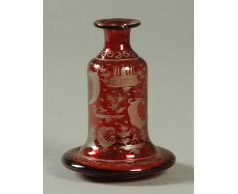 A 19th century Bohemian ruby glass flask, with label to base "R. Cruickshank".  Height 14 cm. 