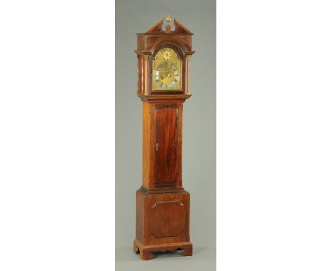 A late 19th century mahogany longcase clock, with triangular pediment to the hood, brass dial and two-train striking movement
