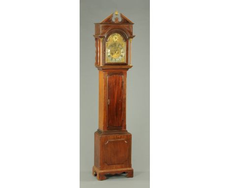 A late 19th century mahogany longcase clock, with triangular pediment to the hood, brass dial and two-train striking movement