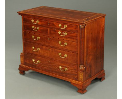 A George III mahogany North Country chest of drawers, with crossbanded and boxwood and ebony strung top above one long, two s