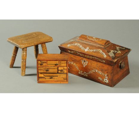 A Regency/William IV inlaid mother of pearl tea caddy, sarcophagus form, width 33 cm, a miniature parquetry chest of drawers,