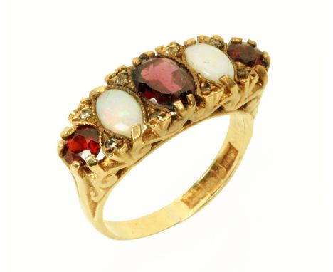 A 9 ct gold opal and garnet ring, size L/M.