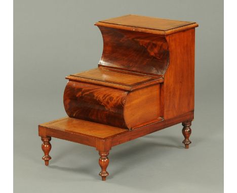 A Victorian mahogany step commode, with tooled leather treads and raised on turned legs.  Width 46 cm, height 65 cm. 