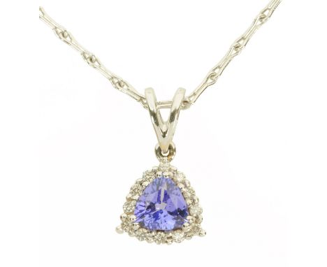 An 18 ct white gold trilliant cut tanzanite and diamond pendant, on chain, total weight +/- .70 carats.