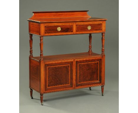 An Edwardian mahogany dumbwaiter, with rear upstand above the rectangular top with satinwood banded, boxwood and ebony strung