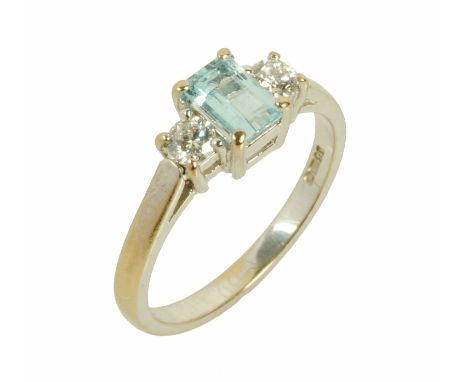 An 18 ct white gold diamond and aquamarine ring, total diamond weight .26 carats, clarity SI1, colour (GIA scale) G, size M/N