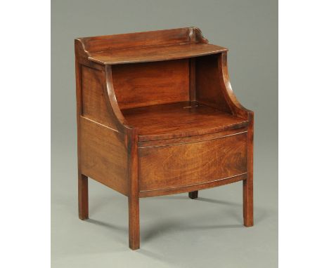 A Regency mahogany bowfronted commode, raised on square legs.  Width 58 cm. 