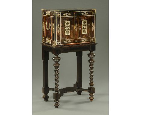 A 19th century Italian inlaid bone collectors cabinet, probably coromandel wood, and raised on a stand with turned legs unite