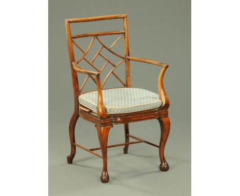 A Chinese influence Edwardian mahogany armchair.    CONDITION REPORT:  This chair has never been caned.  The current mahogany