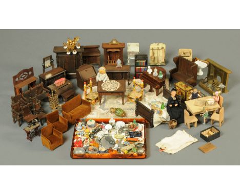 A quantity of dolls house furniture, and related items.   CONDITION REPORT:   The majority of the pieces are in generally goo