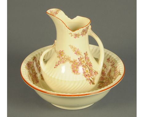 A George Jones & Son Crescent China Peach Glow toilet jug and basin, and a pair of late Victorian vases with brown and yellow