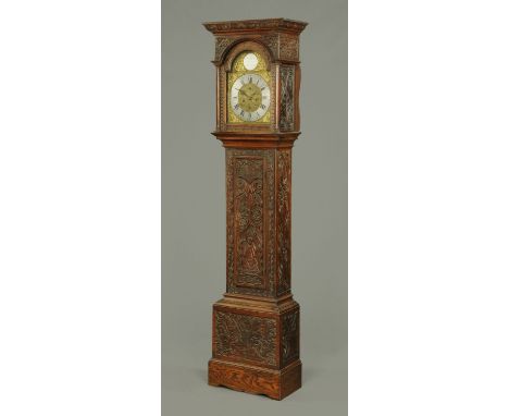 A George III oak longcase clock, with two-train striking movement by Robert Wilson, South Moor House, the case later carved. 