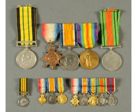 A First World War trio of medals, unnamed, and two miniature sets, an Edwardian Africa medal to Dr. F.B. Thompson S.N. Regime