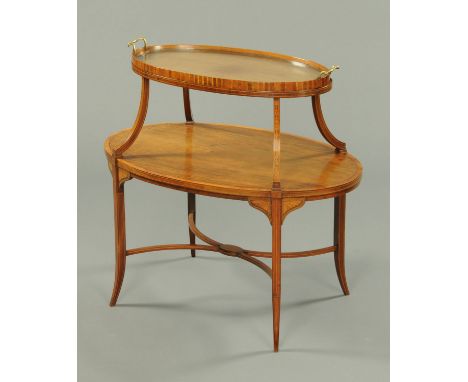 An Edwardian mahogany and satinwood banded tray topped etagere, the lift off tray with glass base, the whole raised on splaye